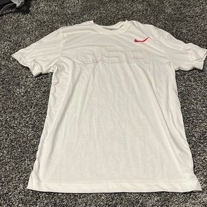 The brand is Nike the size is small and the color is white